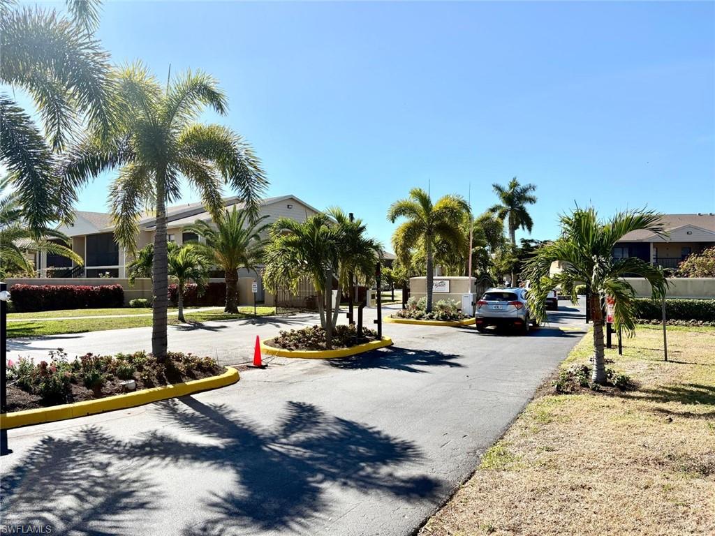 5315 Summerlin Road, Unit 1508 Fort Myers, FL 33919 - Photo 29 of 46 a view of a park with palm trees
