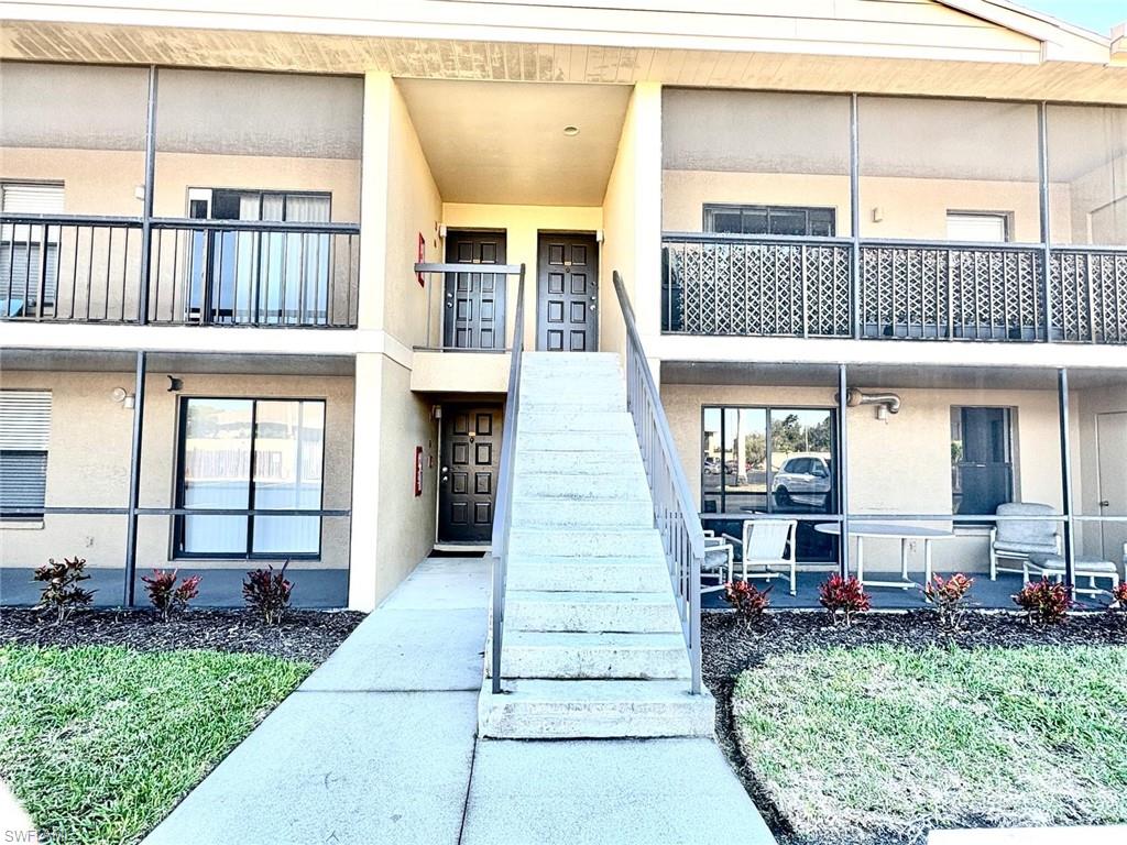 5315 Summerlin Road, Unit 1508 Fort Myers, FL 33919 - Photo 3 of 46 a front view of a house with outdoor seating