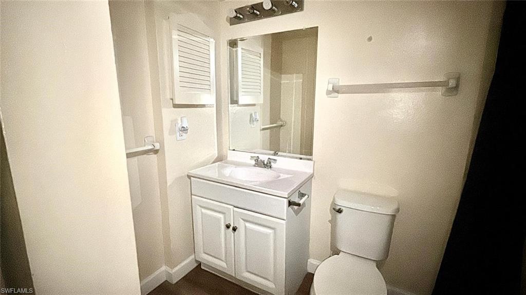 5315 Summerlin Road, Unit 1508 Fort Myers, FL 33919 - Photo 37 of 46 a bathroom with a sink toilet and shower