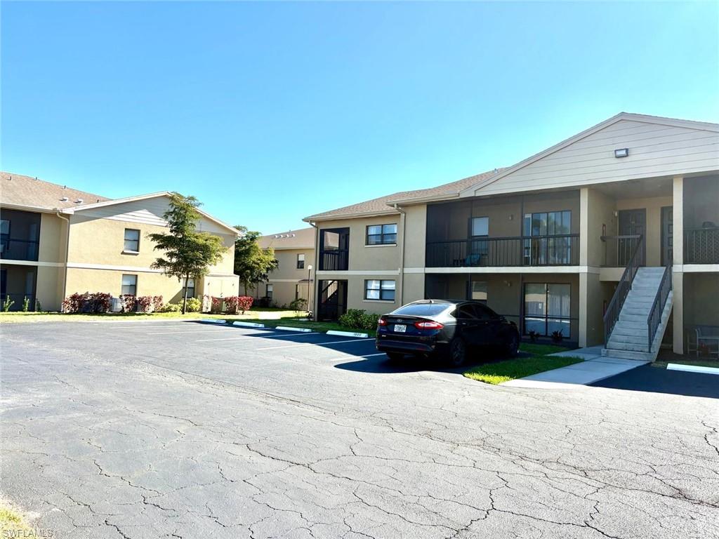 5315 Summerlin Road, Unit 1508 Fort Myers, FL 33919 - Photo 4 of 46 a car parked in front of a house