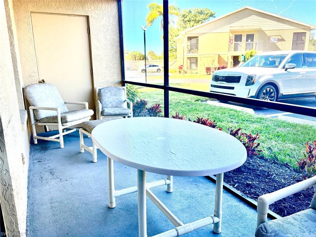 5315 Summerlin Road, Unit 1508 Fort Myers, FL 33919 - Photo 5 of 46 a view of an outdoor sitting area with furniture
