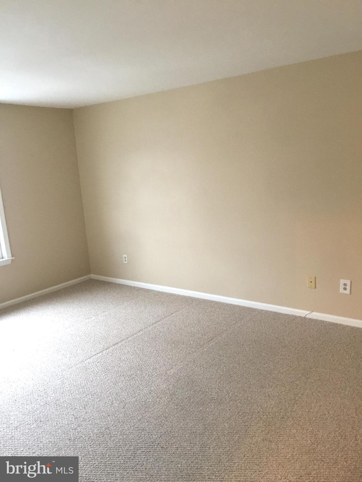 10715 Kings Riding Way, Unit 202 North Bethesda, MD 20852 - Photo 14 of 17 a view of an empty room