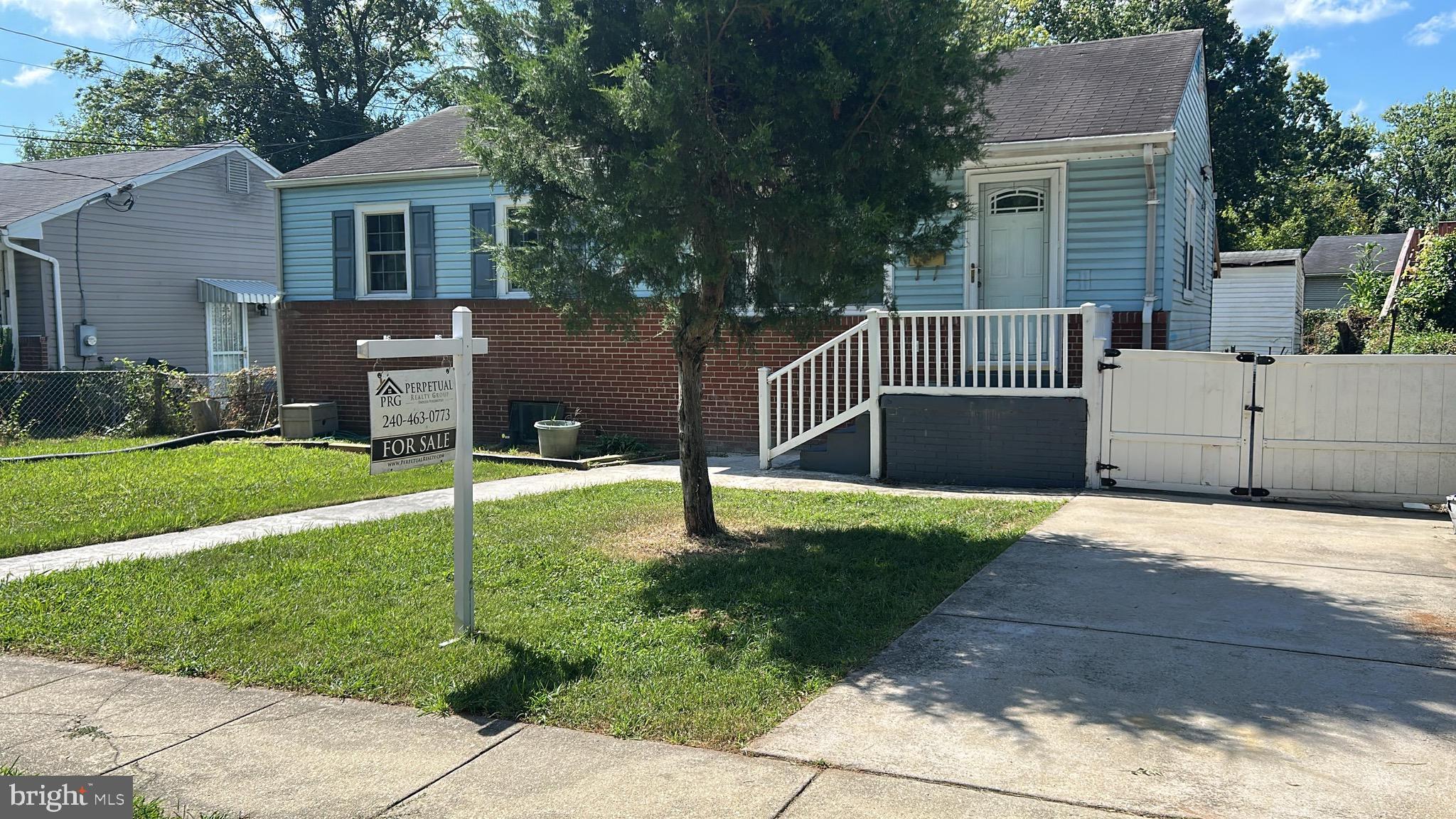 7003 Fairwood Road Hyattsville, MD 20784 - Photo 1 of 30 a house view with a garden space