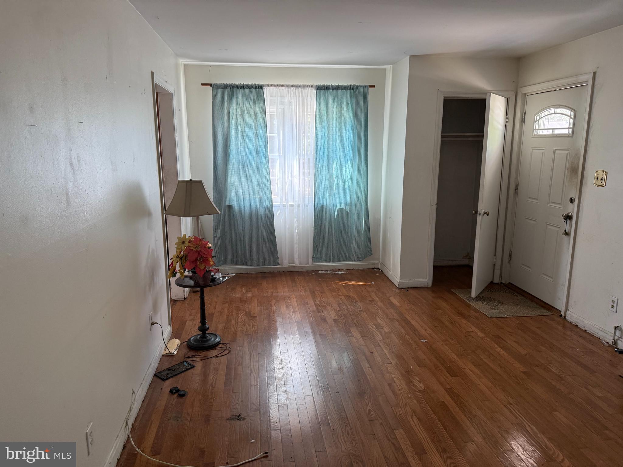 7003 Fairwood Road Hyattsville, MD 20784 - Photo 16 of 30 an entryway at livingroom with furniture and wooden floor