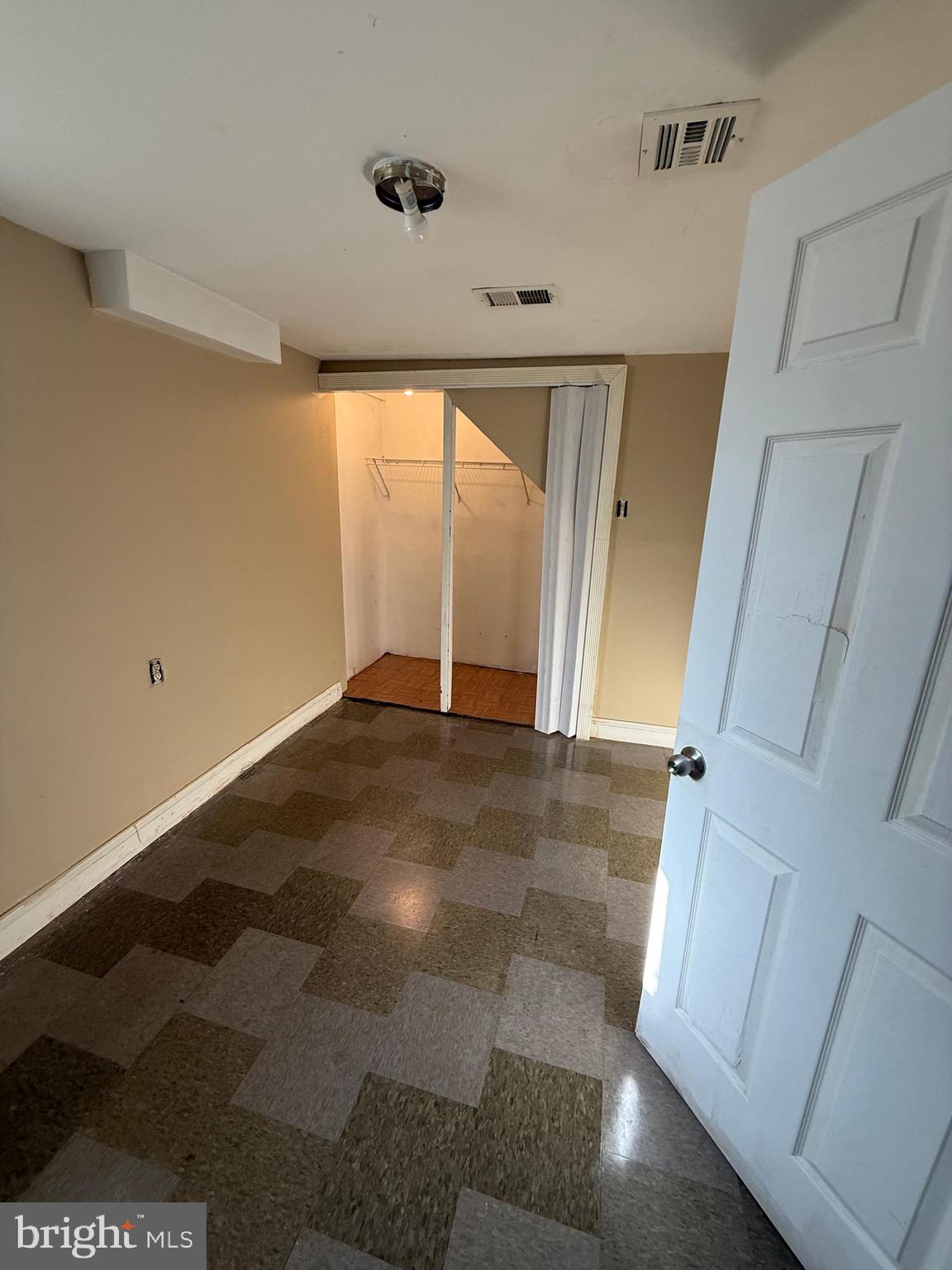7003 Fairwood Road Hyattsville, MD 20784 - Photo 28 of 30 a view of an empty room with a window
