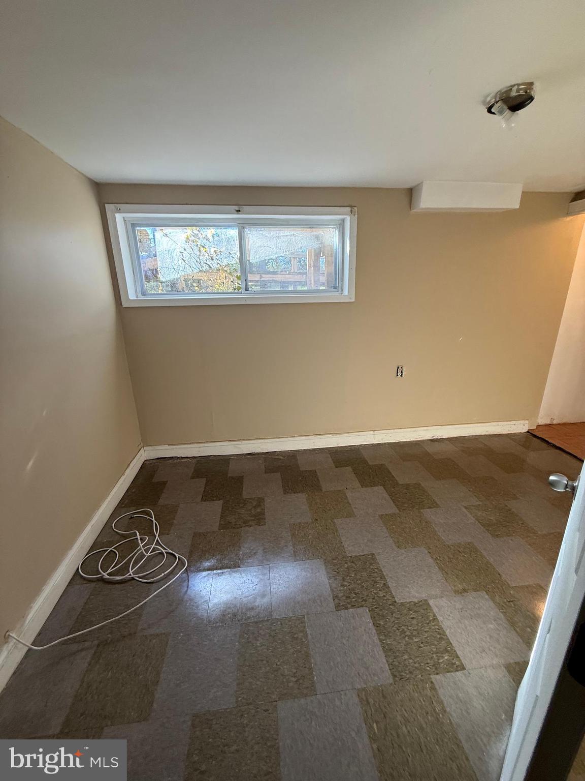 7003 Fairwood Road Hyattsville, MD 20784 - Photo 30 of 30 a view of wooden floor and windows in a room