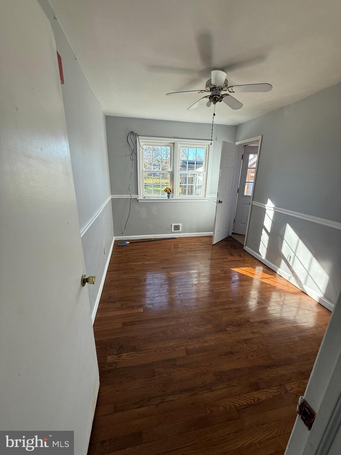 7003 Fairwood Road Hyattsville, MD 20784 - Photo 5 of 30 a view of an empty room with a window
