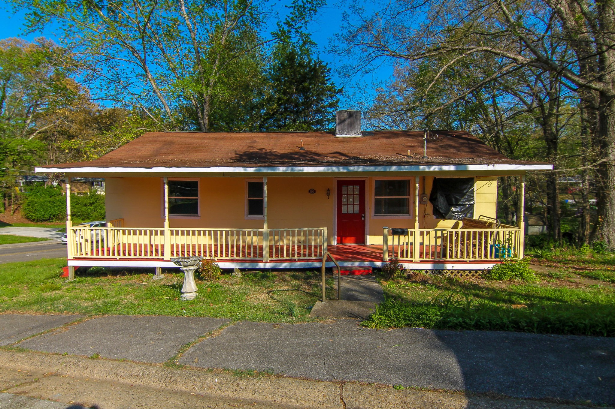 front view of a house with a yard