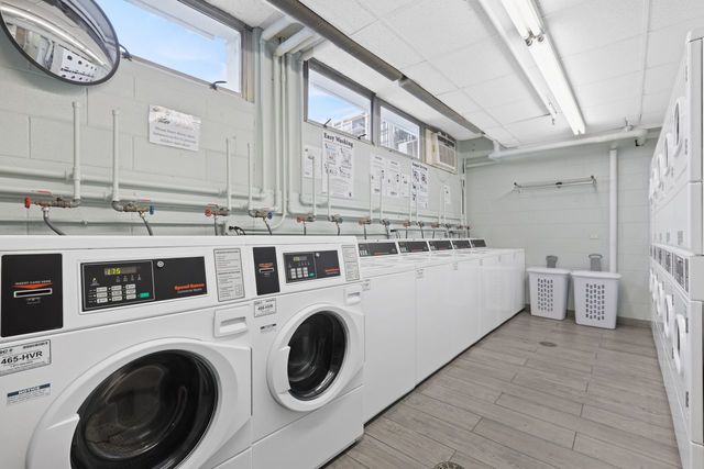 8809 West Golf Road, Unit 2B Niles, IL 60714 - Photo 15 of 17 a utility room with dryer and washer
