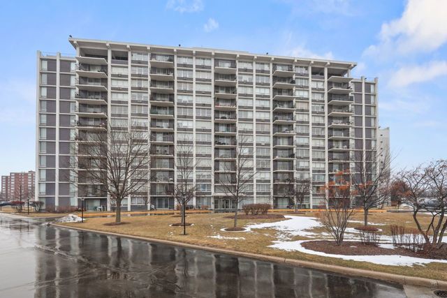8809 West Golf Road, Unit 2B Niles, IL 60714 - Photo 17 of 17 a view of a building with a outdoor space