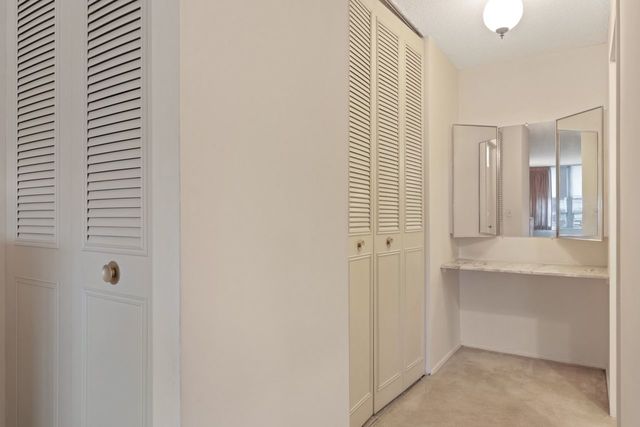 8809 West Golf Road, Unit 2B Niles, IL 60714 - Photo 7 of 17 a view of a bathroom with a shower