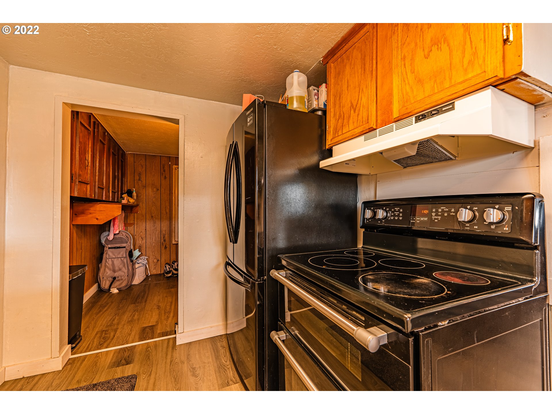 2740 D Street Springfield, OR 97477 - Photo 11 of 21 a kitchen with stainless steel appliances granite countertop a refrigerator and a stove