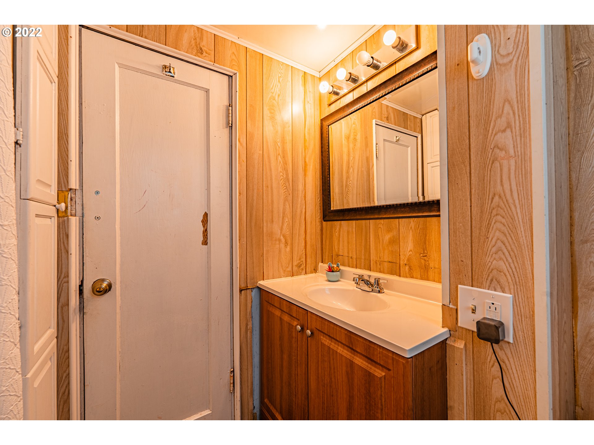 2740 D Street Springfield, OR 97477 - Photo 15 of 21 a bathroom with a sink and a mirror