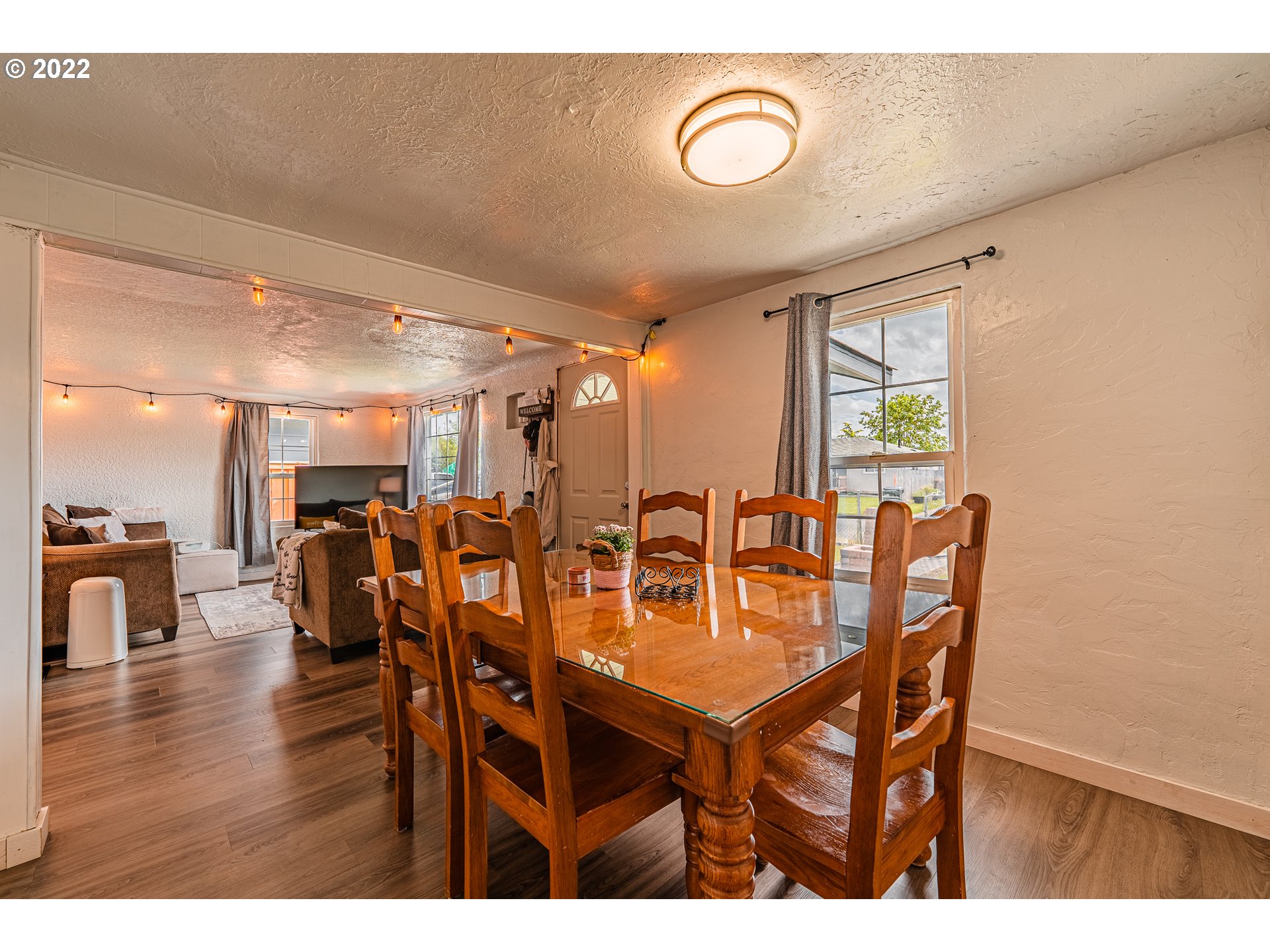 2740 D Street Springfield, OR 97477 - Photo 7 of 21 a dining room with furniture and wooden floor