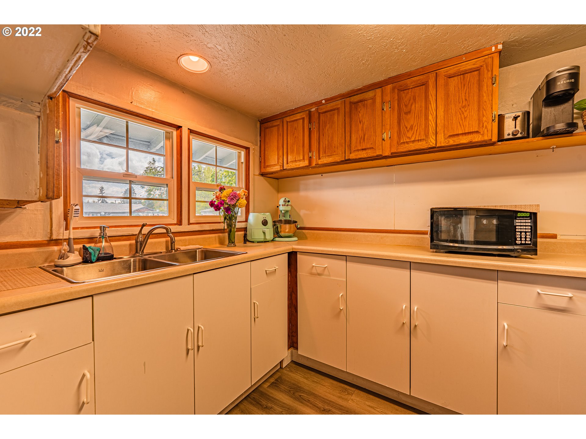2740 D Street Springfield, OR 97477 - Photo 8 of 21 a kitchen with stainless steel appliances granite countertop a sink and cabinets