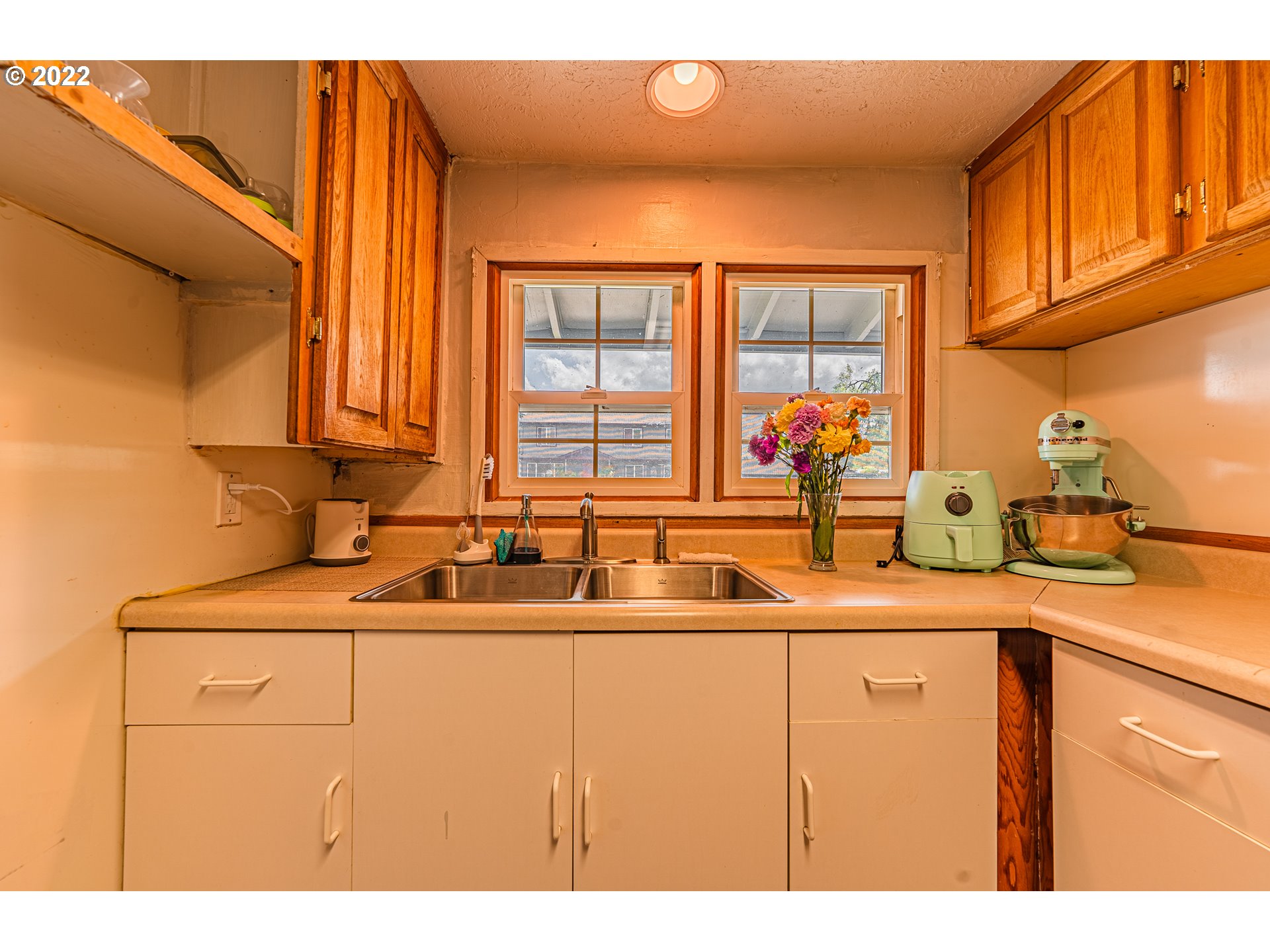 2740 D Street Springfield, OR 97477 - Photo 10 of 21 a kitchen with a sink and a window