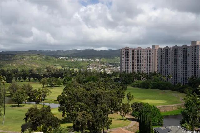 a view of lake with green space