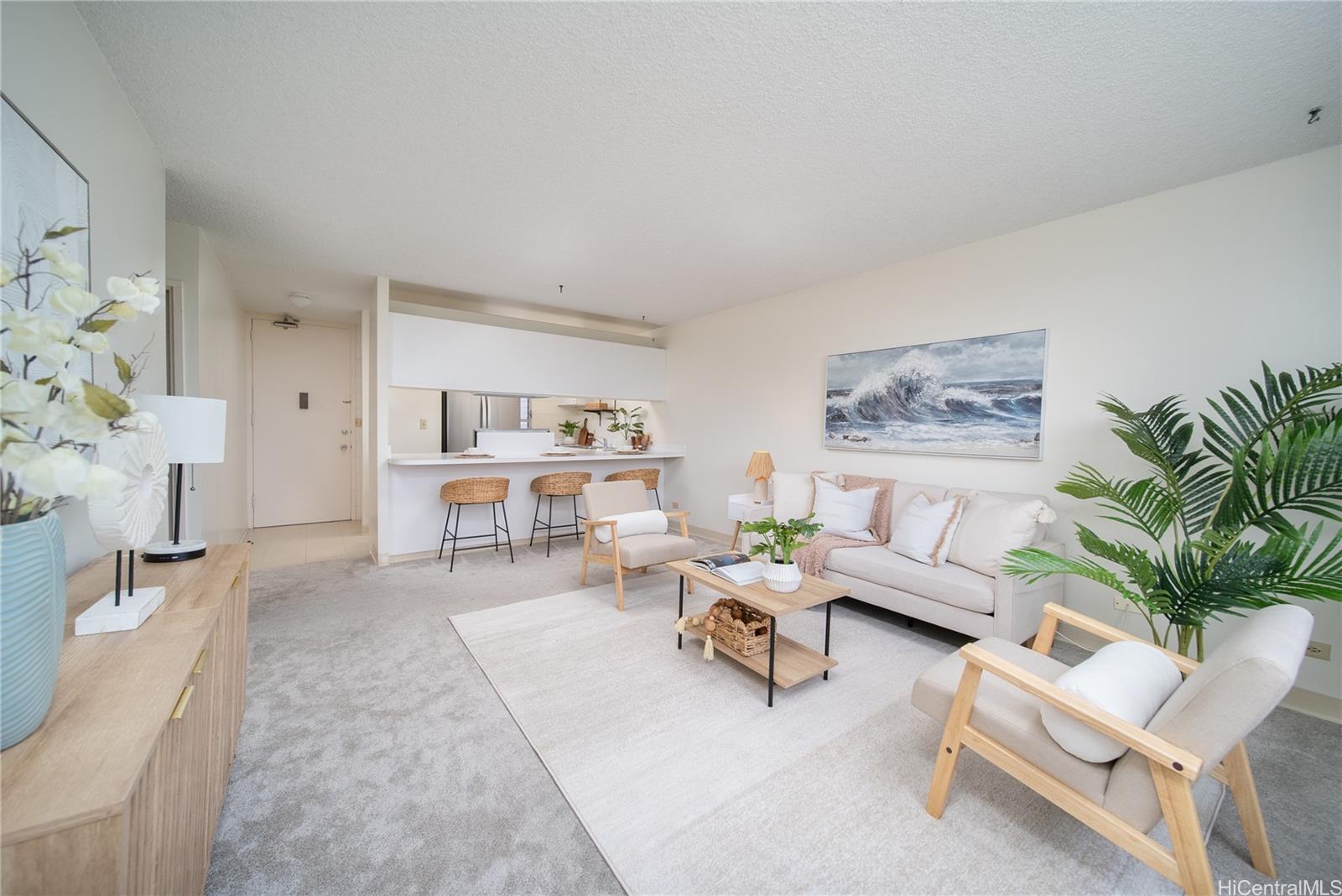 3030 Ala Ilima Street, Unit 907 Honolulu, HI 96818 - Photo 3 of 25 a living room with furniture and a painting on the wall