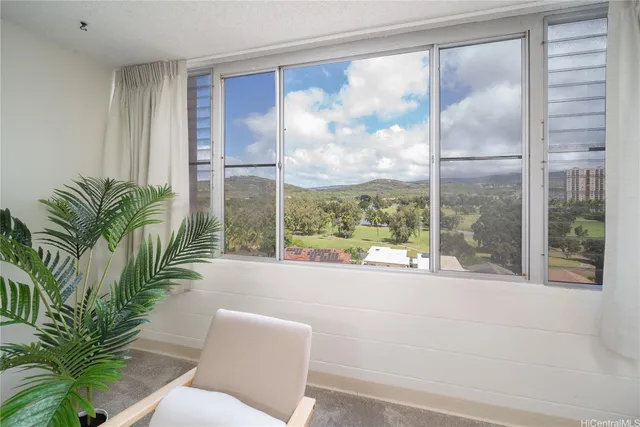 a room with balcony and furniture