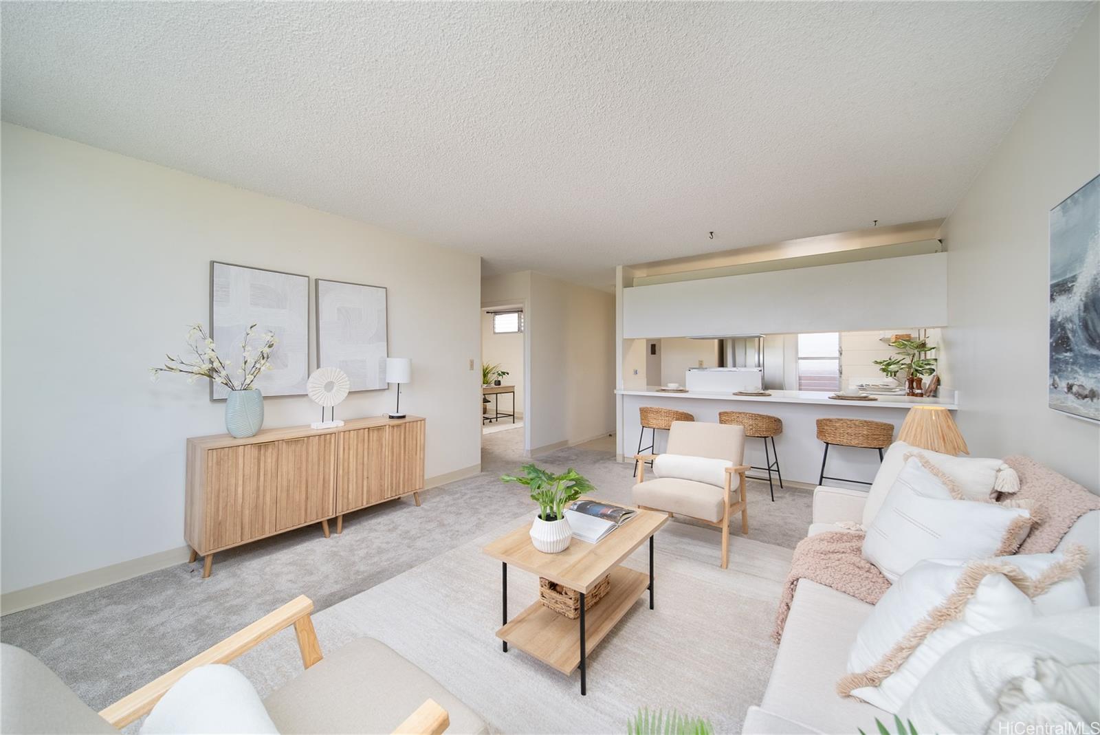 3030 Ala Ilima Street, Unit 907 Honolulu, HI 96818 - Photo 6 of 25 a living room with furniture and wooden floor