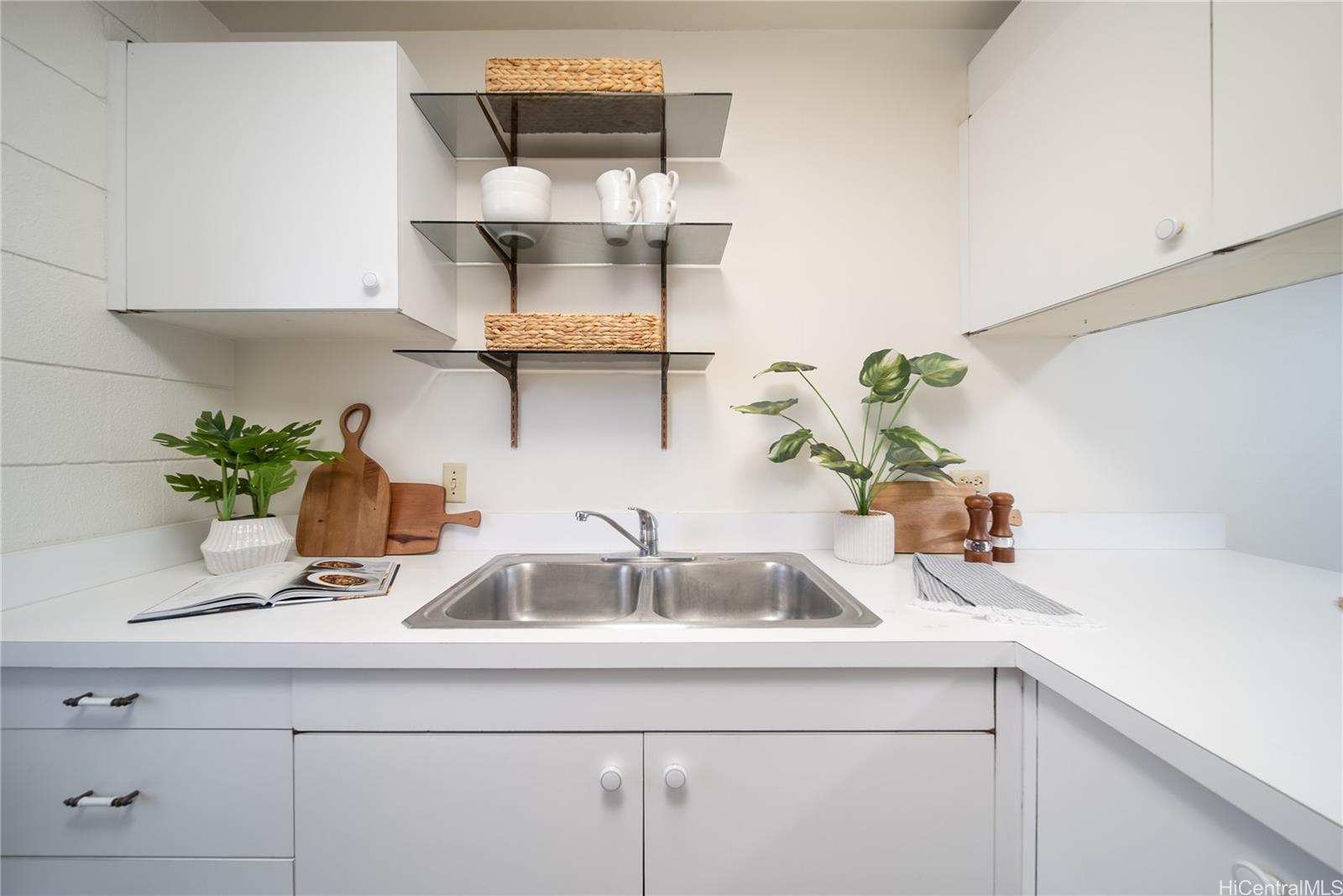 3030 Ala Ilima Street, Unit 907 Honolulu, HI 96818 - Photo 9 of 25 a close view of sink and tap