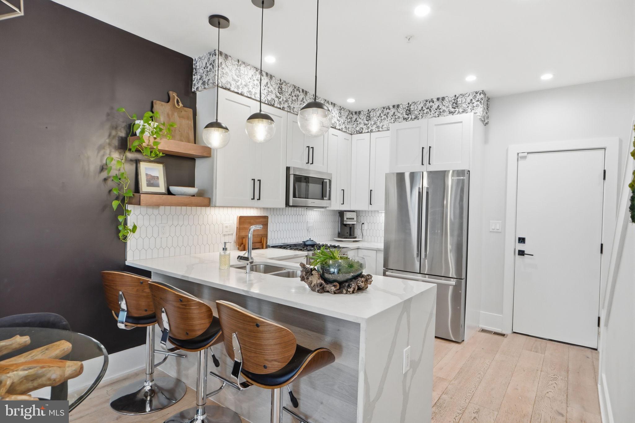 1216 I Street Northeast, Unit B Washington, DC 20002 - Photo 4 of 40 Spacious kitchen with waterfall quartz island