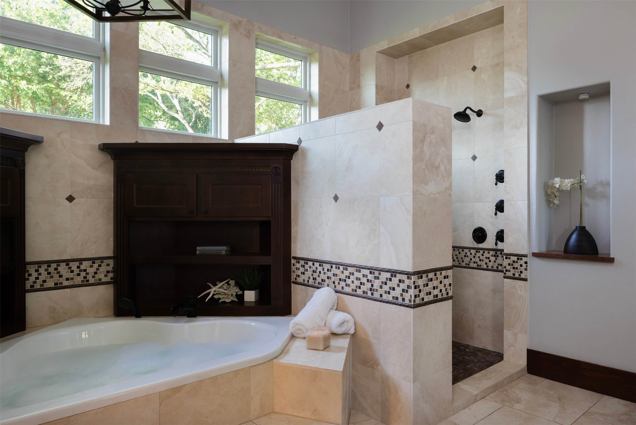 15016 Flat Top Ranch Road Austin, TX 78732 - Photo 26 of 40 Bathroom featuring walk in shower, a garden tub, and tile patterned floors