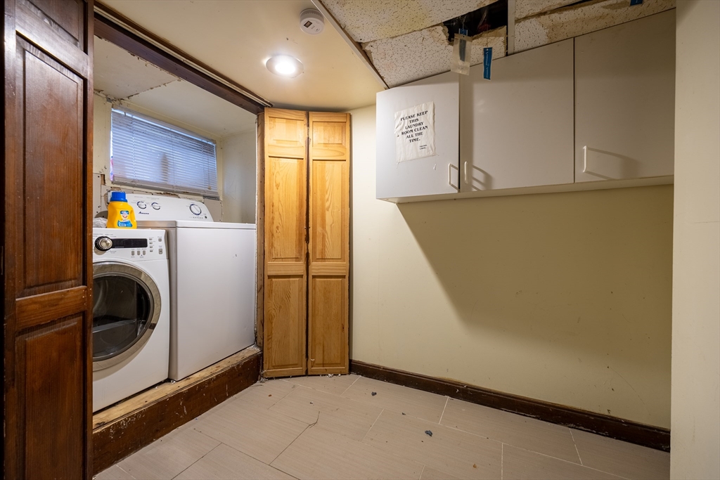 31 Seattle Street, Unit 1 Boston, MA 02134 - Photo 17 of 31 a view of storage and utility room with washer and dryer