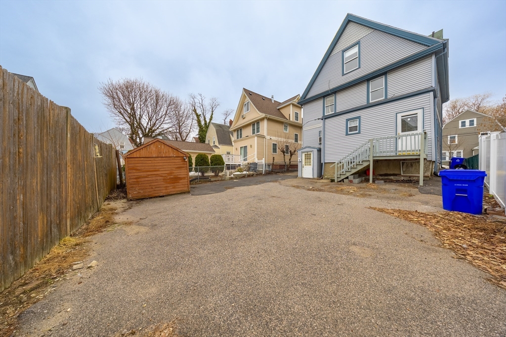 31 Seattle Street, Unit 1 Boston, MA 02134 - Photo 4 of 31 a view of a house with a parking space in front of it