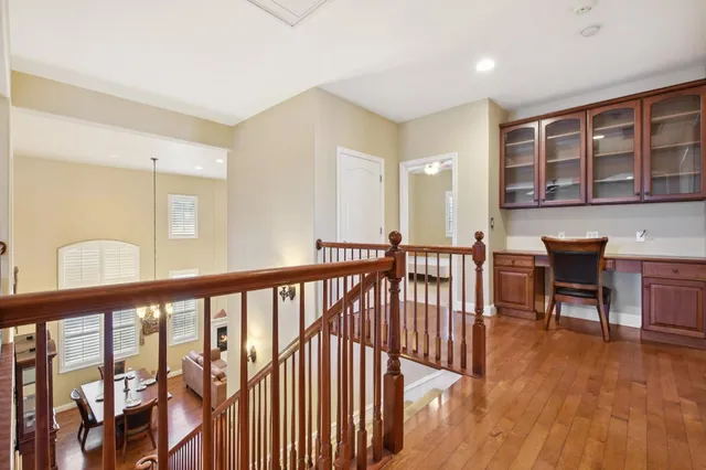a view of a balcony with chairs