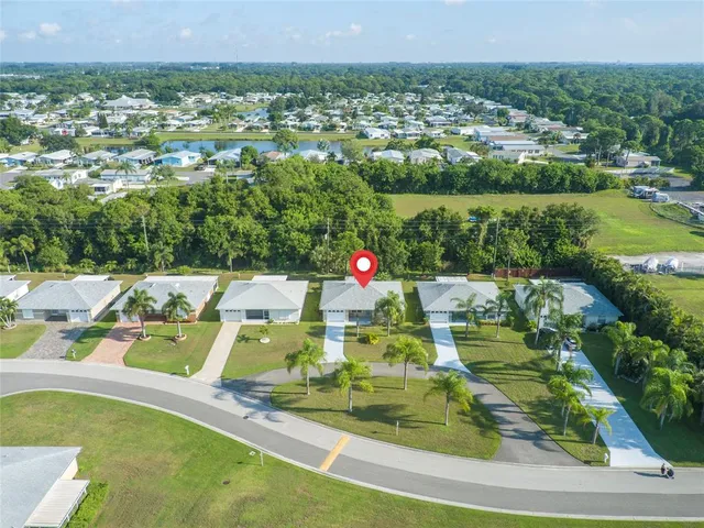 a view of a lake with a houses