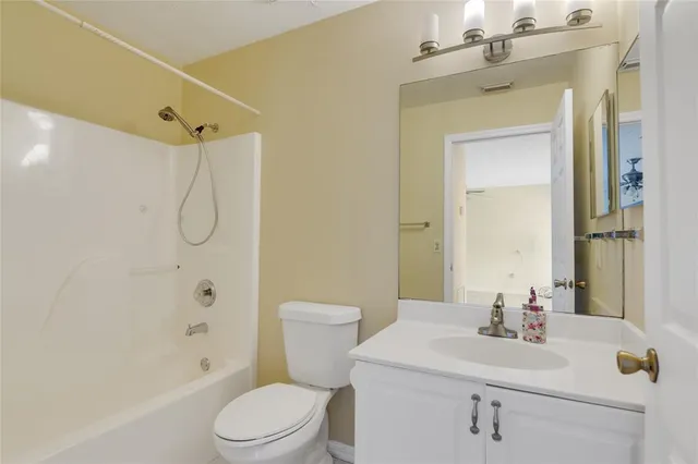 a front view of house with yard and outdoor seating