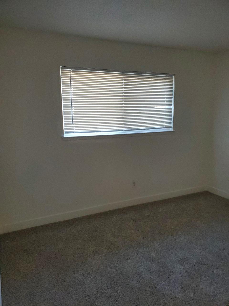 6012-6014 Bourbon Drive Carmichael, CA 95608 - Photo 24 of 30 an empty room with a window