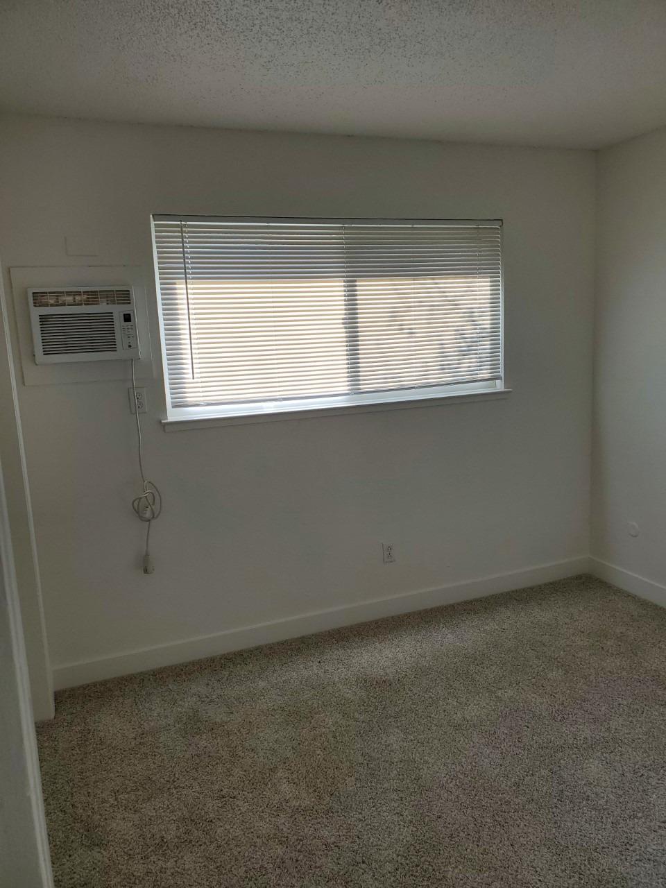 6012-6014 Bourbon Drive Carmichael, CA 95608 - Photo 26 of 30 a room that has a window in it