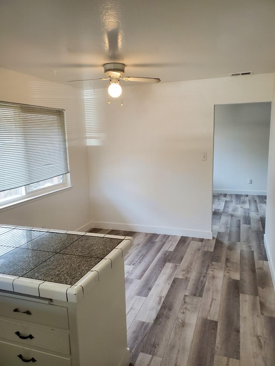 6012-6014 Bourbon Drive Carmichael, CA 95608 - Photo 7 of 30 a view of kitchen and utility room