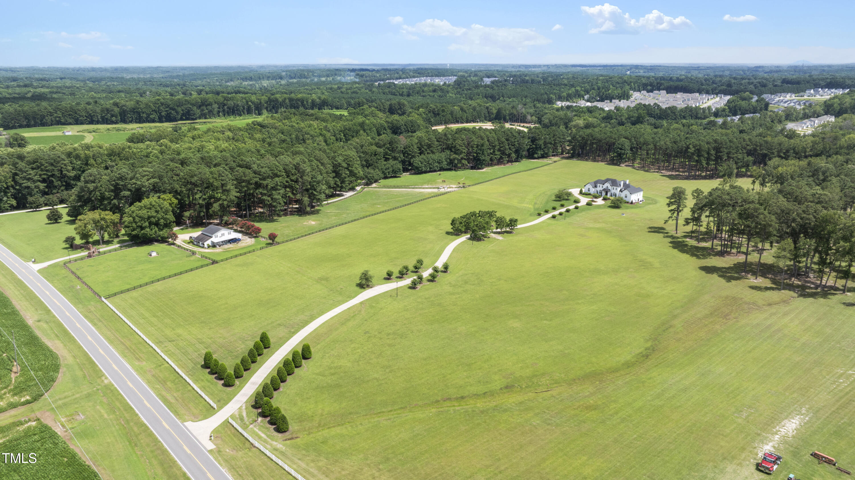 9816 Debnam Road Zebulon, NC 27597 - Photo 3 of 10 a view of a tennis court