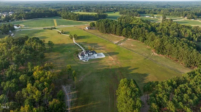 a view of a lake with a yard