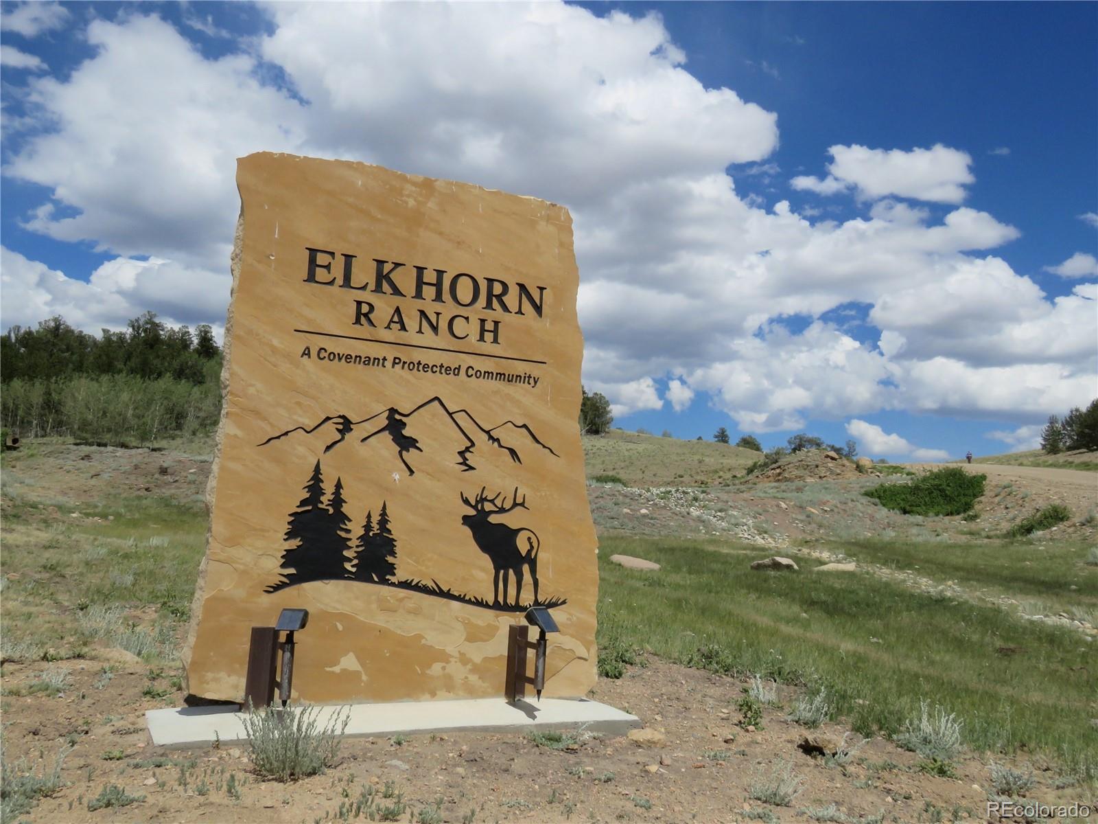 104 Hawk Way Como, CO 80432 - Photo 2 of 19 a sign that is on the side of the road