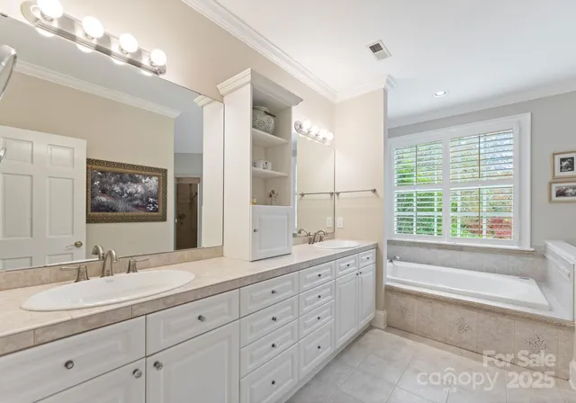 a white toilet sitting next to a bathroom sink