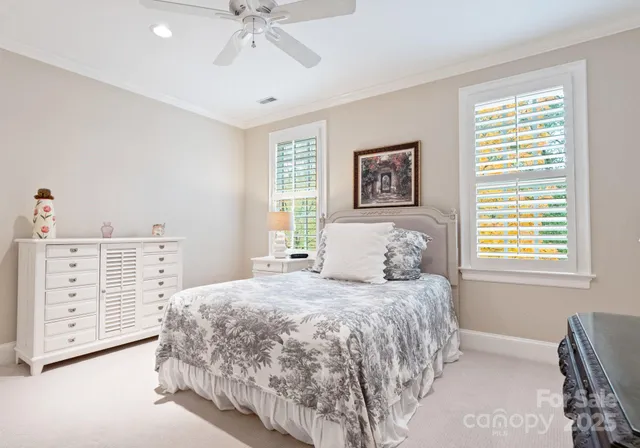 a bathroom with a sink toilet a mirror and shower