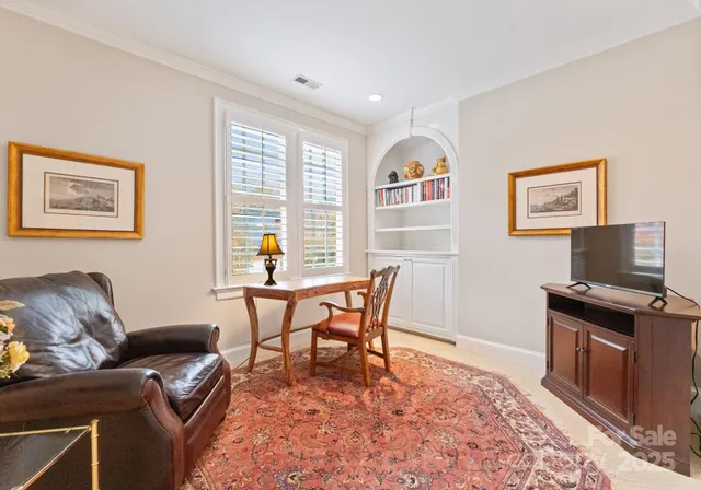 a view of patio with swimming pool