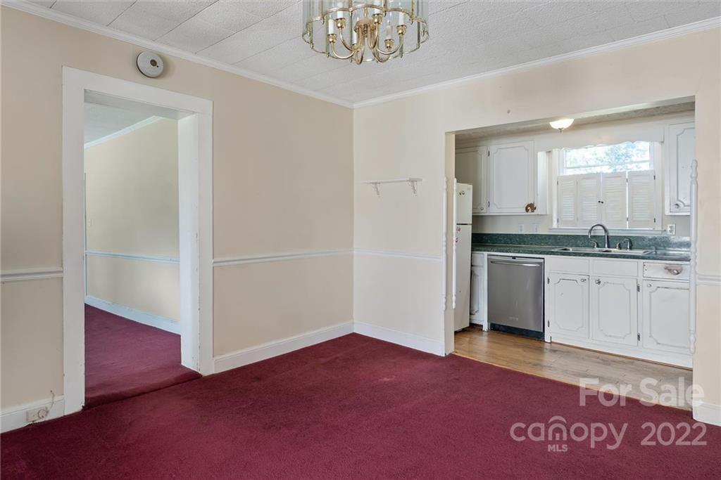 6700 Lineberger Road Sherrills Ford, NC 28673 - Photo 15 of 25 a spacious bathroom with a granite countertop sink and a mirror