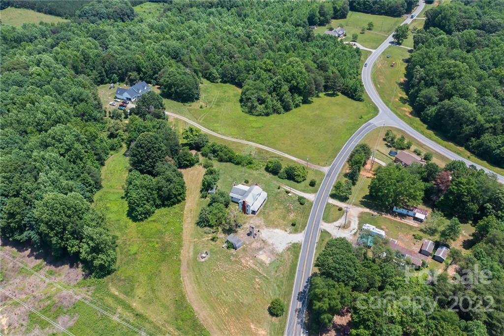 6700 Lineberger Road Sherrills Ford, NC 28673 - Photo 6 of 25 an aerial view of house with swimming pool outdoor seating and yard