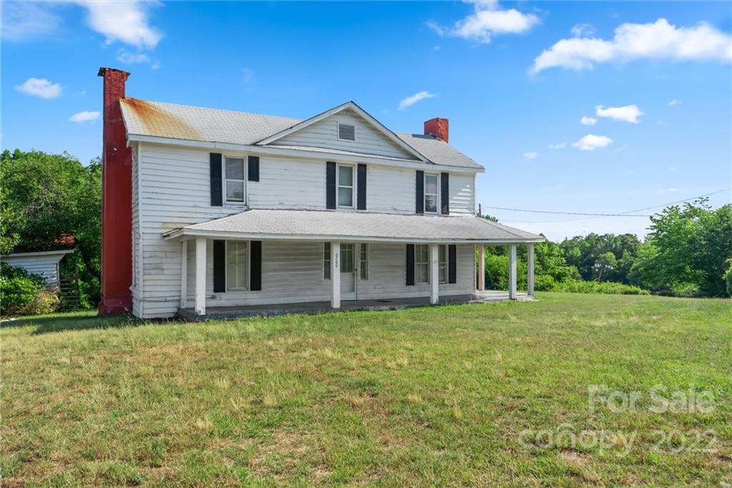 6700 Lineberger Road Sherrills Ford, NC 28673 - Photo 7 of 25 a view of a house with a yard and potted plants