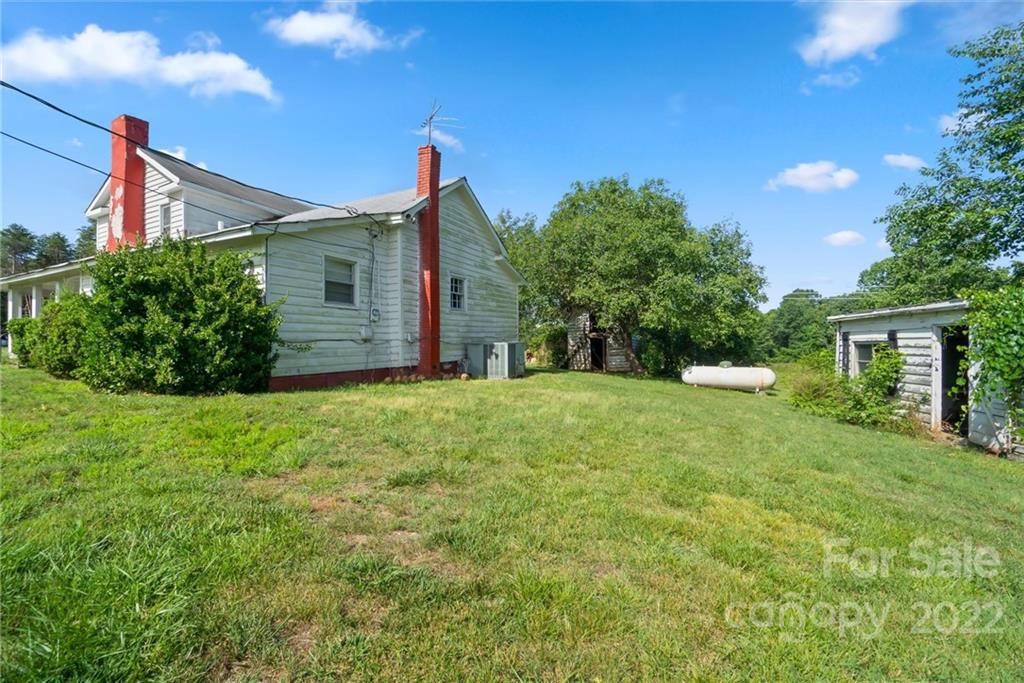 6700 Lineberger Road Sherrills Ford, NC 28673 - Photo 8 of 25 a view of a house with yard and tree s