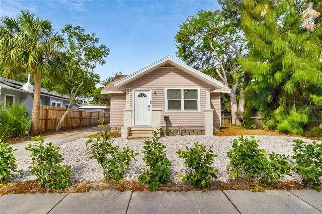 front view of a house with a small yard