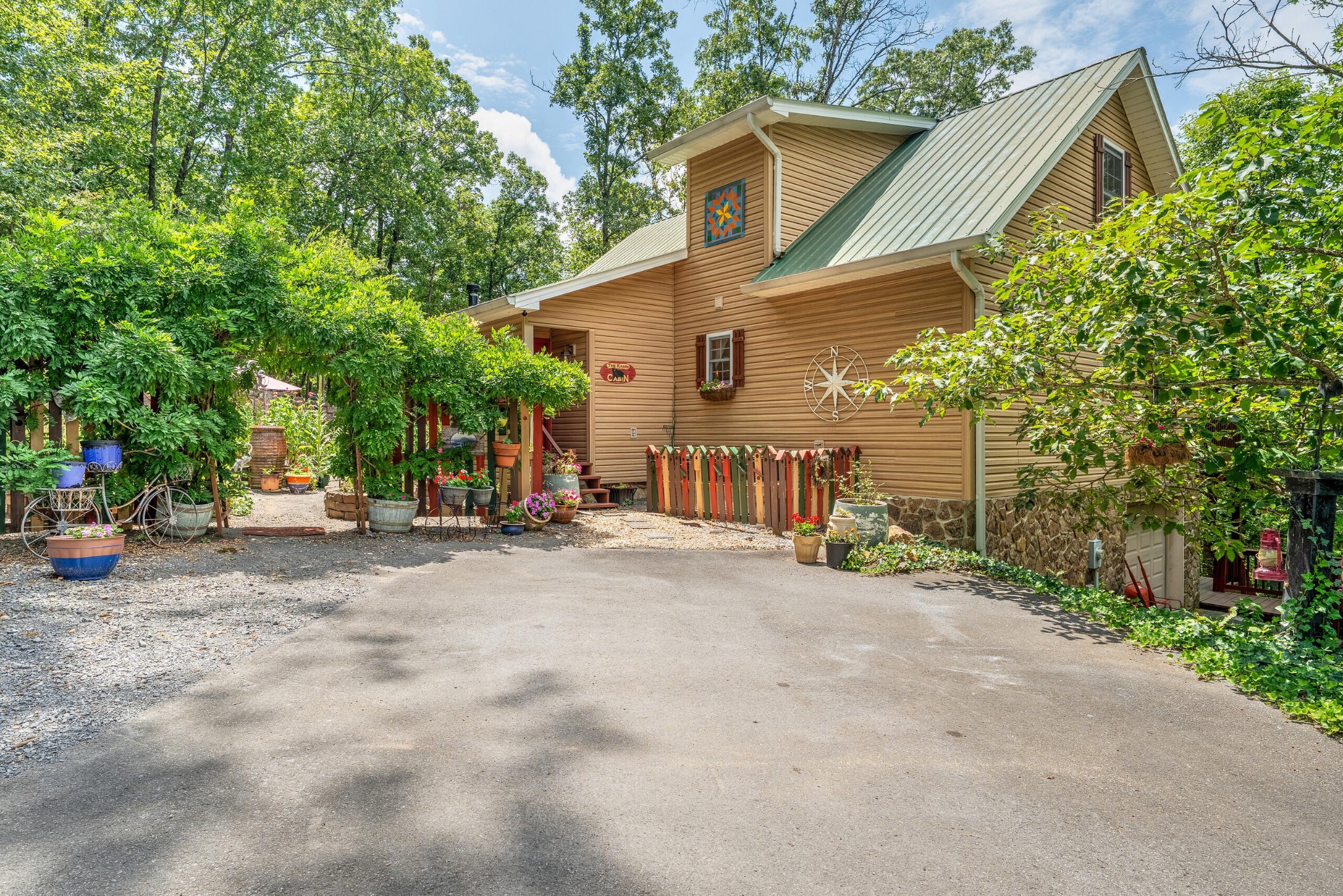 260 Deer Ridge Trail Ocoee, TN 37361 - Photo 30 of 72 a view of a house with a yard and garage