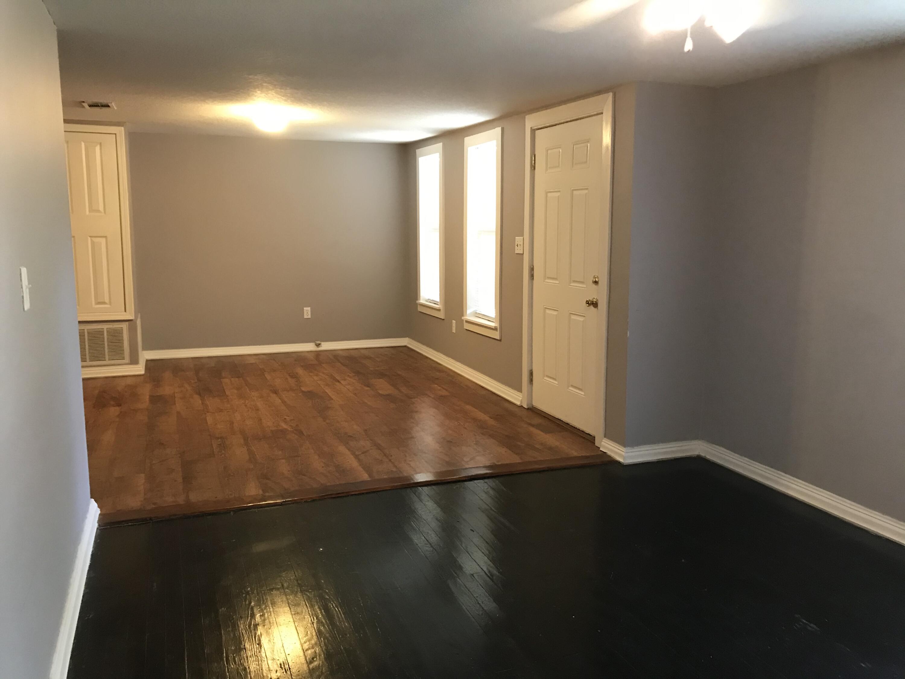 5098 Galiver Cutoff, Unit A Baker, FL 32531 - Photo 2 of 8 a view of an empty room and window