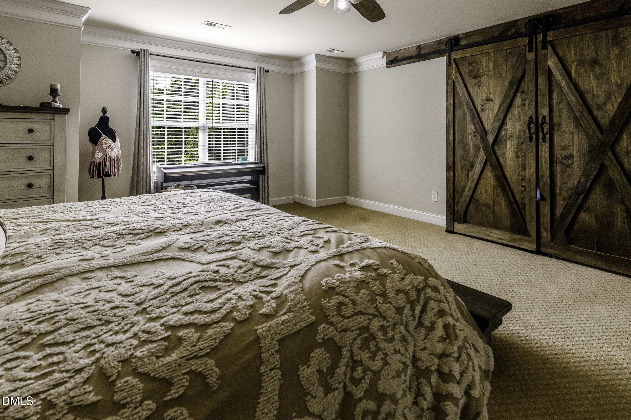 201 Quarryrock Road Holly Springs, NC 27540 - Photo 26 of 34 a bedroom with a bed and a window