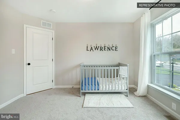 a view of a room with an entryway